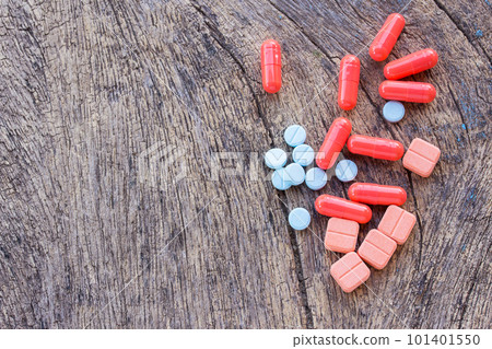 Close up pills on a wooden table. 101401550