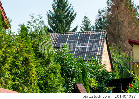 Historic farm house with modern solar panels on roof and wall High quality photo Historic farm house with modern solar panels on roof and wall High quality photo 101404088