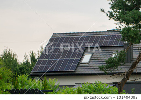 Historic farm house with modern solar panels on roof and wall High quality photo Historic farm house with modern solar panels on roof and wall High quality photo 101404092