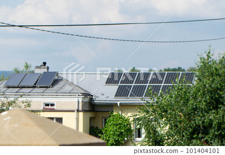 Historic farm house with modern solar panels on roof and wall High quality photo Historic farm house with modern solar panels on roof and wall High quality photo 101404101