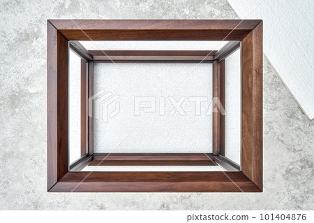 Wooden frame of bedside table made of solid walnut in workshop. Joinery angular joint of planks on dowels 101404876