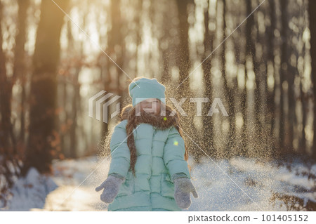 girl in the snowy forest girl in the snowy forest 101405152