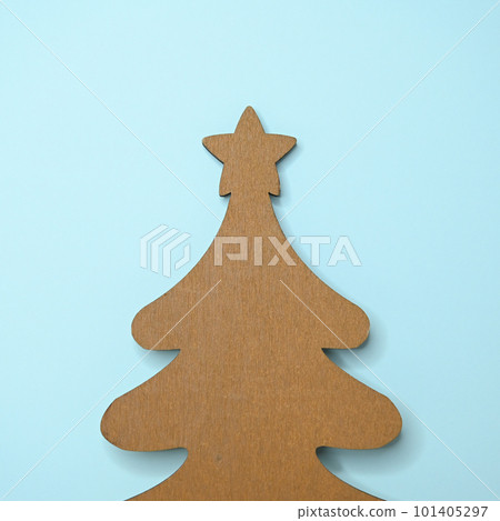 wooden christmas tree on blue background 101405297