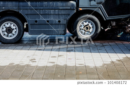 urban sweeper cleans road 101408172