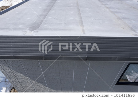 Aerial view of dented eaves due to snow damage (before and after housing renovation) Aerial view of dented eaves due to snow damage (before and after housing renovation) 101411656