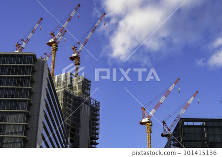 Urban landscape with a large construction site Urban landscape with a large construction site 101415136