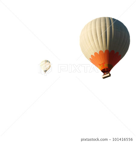 Balloons with tourists isolated against a white background. Beautiful view of the colourful balloons from below. Balloons with tourists isolated against a white background. Beautiful view of the colourful balloons from below. 101416556