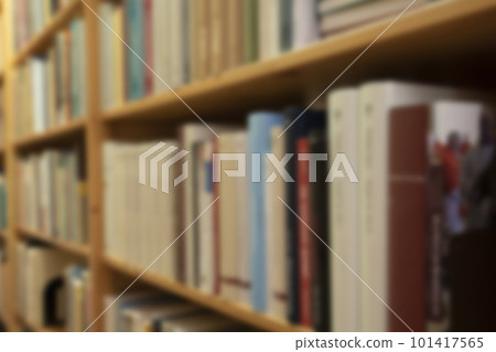 Public library blurred books, books on bookshelf in library, abstract blur defocused background vintage design, Hallway Public library blurred books, books on bookshelf in library, abstract blur defocused background vintage design, Hallway 101417565