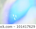 Unfocused holographic colors of mother-of-pearl foil. Blurry holographic abstract background in blue tones. Holographic iridescent abstract background made of rainbow foil. High quality photo 101417629