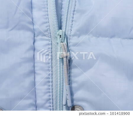 Fragment of a blue jacket with a zipper Fragment of a blue jacket with a zipper 101418900