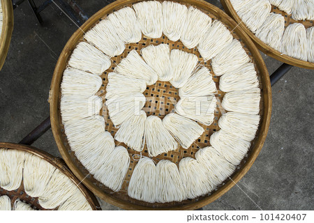 Close-up of traditional handmade noodle-making drying outdoors in Guanmiao, Tainan, Taiwan. 101420407