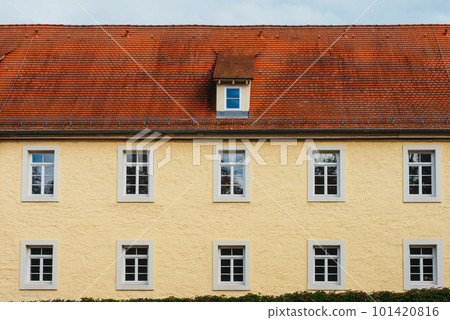 Facade of a historical German yellow house, Germany, Europe. Traditional house in the small Europian town. european house germany yellow house 101420816