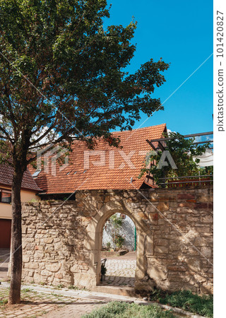 Traditional small house with beautiful outdoor decor facade in Germany. German old brick building house ancient European city German architect 101420827