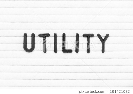 Black color letter in word utility on white felt board background 101421082