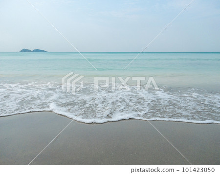 The clear soft waves from the sea on the quiet beach. The clear soft waves from the sea on the quiet beach. 101423050