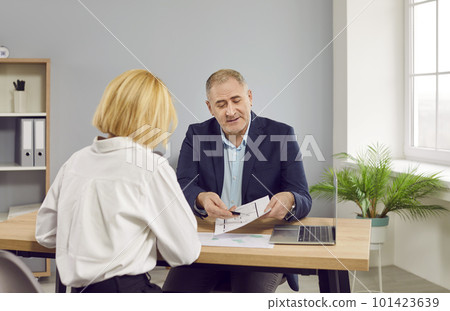 Real estate agent and customer meeting for house investment. 101423639