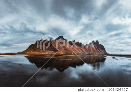 Famous Stokksnes mountains on Vestrahorn cape Famous Stokksnes mountains on Vestrahorn cape 101424427