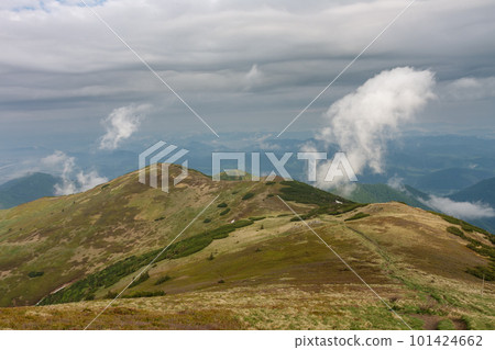 View from mountain Pekelnik, mountain pass Bublen, national park Mala Fatra, Slovakia in spring cloudy day View from mountain Pekelnik, mountain pass Bublen, national park Mala Fatra, Slovakia in spring cloudy day 101424662