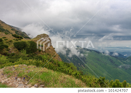 Mountain pass Bublen, path to Maly Krivan, national park Mala Fatra, Slovakia, in spring cloudy day Mountain pass Bublen, path to Maly Krivan, national park Mala Fatra, Slovakia, in spring cloudy day 101424707