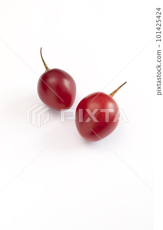 Isolated Fresh Tamarillo Fruit On White Background. Egg-shaped Edible Fruit Known As Tree Tomato, Plant Family Solanaceae, Solanum Betaceum. Top View. Flat Lay. Vertical Plane 101425424