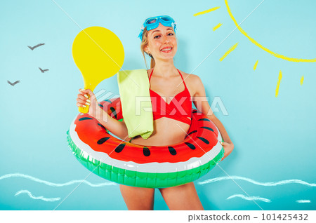 Woman is happy to go play in the beach in summer 101425432