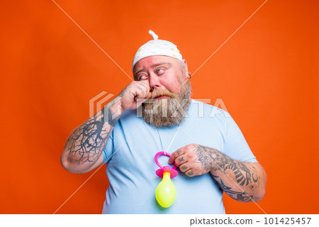 Funny man with wig act like a baby and cries for something 101425457