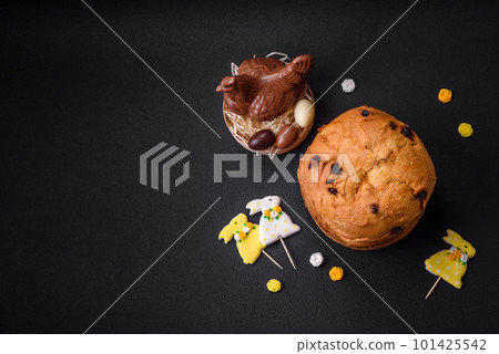 Easter cake or panettone with raisins and candied fruits Easter cake or panettone with raisins and candied fruits 101425542