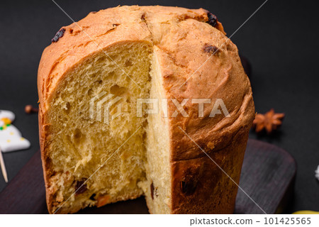 Easter cake or panettone with raisins and candied fruits Easter cake or panettone with raisins and candied fruits 101425565