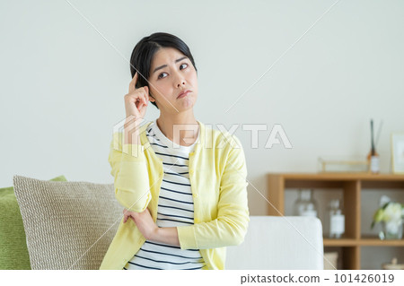 Worried woman Woman with anxiety Woman thinking about something 101426019