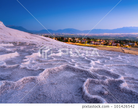 Summer landscape during sunset. The view of the travertines and the bright sunset. Summer landscape during sunset. The view of the travertines and the bright sunset. 101426542