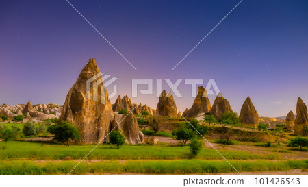 Rocks and the sky with stars. View of the rocks at night. Landscape in the summertime. 101426543