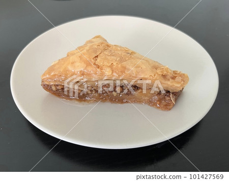 Baklava is a traditional dessert from Greece, Turkey and the Middle East. Baklava is a traditional dessert from Greece, Turkey and the Middle East. 101427569
