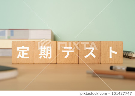 A desk with a block written as a regular test A desk with a block written as a regular test 101427747
