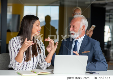 Mature businessman leader mentor talking to diverse colleagues team listening to caucasian ceo. 101431643