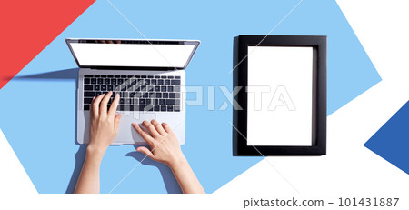 Laptop computer with a blank photo frame Laptop computer with a blank photo frame 101431887