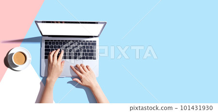 Person using a laptop computer Person using a laptop computer 101431930