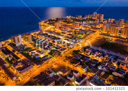Panoramic aerial view of lighted Oropesa del Mar in twilight, Spain Panoramic aerial view of lighted Oropesa del Mar in twilight, Spain 101432325