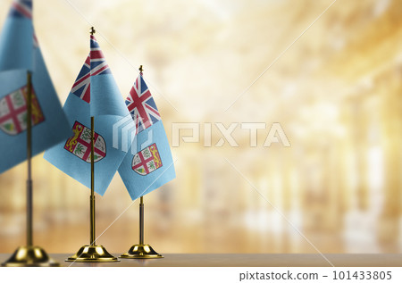 Small flags of the Fiji on an abstract blurry background Small flags of the Fiji on an abstract blurry background 101433805