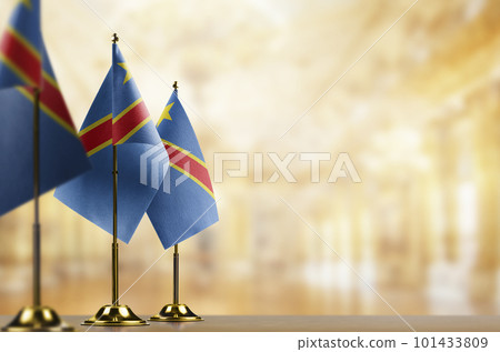 Small flags of the Democratic Republic of the Congo on an abstract blurry background Small flags of the Democratic Republic of the Congo on an abstract blurry background 101433809