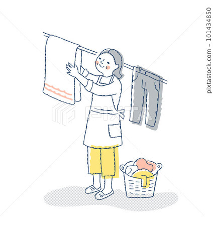 A woman holding laundry A woman holding laundry 101434850