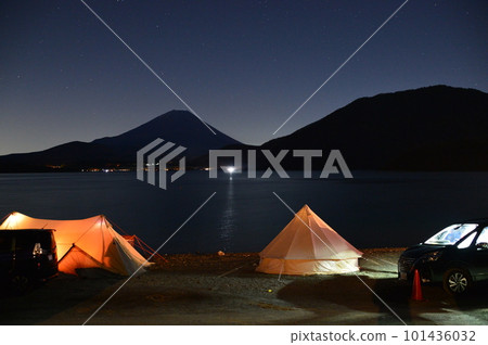 Mount Fuji and setting up a tent at night camping Mount Fuji and setting up a tent at night camping 101436032