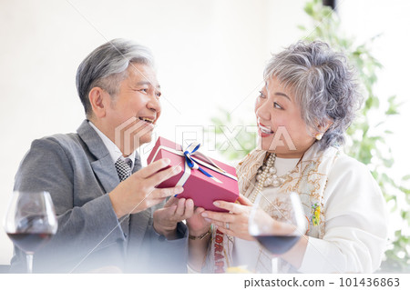 Senior couple celebrating anniversary 101436863