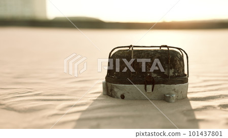 old rusted trash on the sand beach old rusted trash on the sand beach 101437801