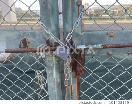 Fence with chain and padlock Fence with chain and padlock 101438159
