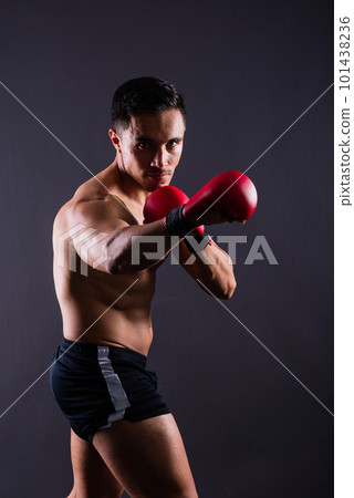 Training, young man and boxer with boxing gloves for competition, prepare for match 101438236
