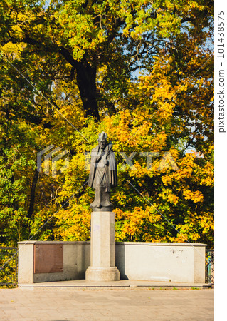 Olsztyn Poland - October 2022 Planet in hand of Nicolaus Copernicus statue near his famous castle. Nicolaus Copernicus statue on the Old Town in Olsztyn. Famous tourist attraction travel 101438575