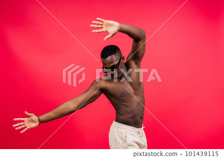 Like what you see. A handsome and muscular young man posing in the studio. Like what you see. A handsome and muscular young man posing in the studio. 101439115