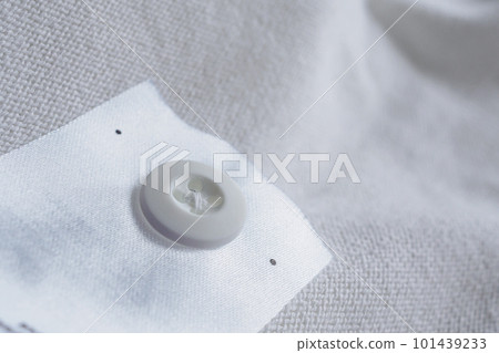 laundry care clothing label with button on cotton shirt laundry care clothing label with button on cotton shirt 101439233