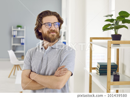 Portrait of confident satisfied business man looking away reflecting on good vision of future. 101439580