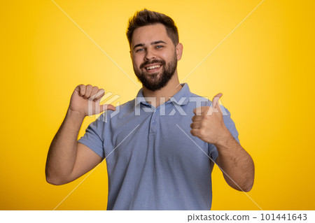 Excited caucasian young winner man feeling very proud pointing hisself, overjoyed by success victory Excited caucasian young winner man feeling very proud pointing hisself, overjoyed by success victory 101441643